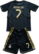 Load image into Gallery viewer, Youth-sized Cristiano Ronaldo 2011-12 Real Madrid Adidas away black jersey with shorts, featuring the number 7 and Ronaldo's name on the back.