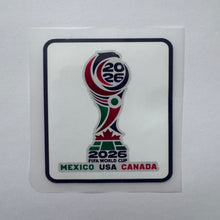 Load image into Gallery viewer, A square sticker featuring the 2026 FIFA World Cup Mexico, USA, and Canada logo, displayed on a white backing sheet against a light gray background.