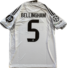 Load image into Gallery viewer, "Jude Bellingham #5 Real Madrid 2025-26 home jersey back view with FIFA Intercontinental Cup and Champions League patches"