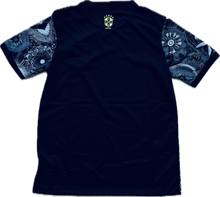 Load image into Gallery viewer, Brazil Nike Christ the Redeemer Black Away Soccer Jersey - Back View Displaying Detailed Cristo Redentor Statue Graphic and Rio de Janeiro Favela Backdrop - Special Edition Brazil National Team Jersey