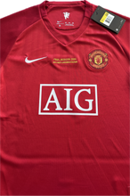 Load image into Gallery viewer,  "Cristiano Ronaldo Manchester United Youth Jersey Product Shot - Nike 2007-2008 Champions League Home Kit with Official #7, Red Devils Crest, and Vintage Soccer Design"