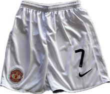 Load image into Gallery viewer, "Manchester United Ronaldo Youth Jersey Close-Up Detail - Nike 2007-2008 Champions League Home Kit with Official Crest, AIG Sponsor Logo, and Premium Red Fabric Construction" Short white