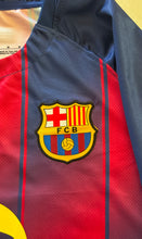 Load image into Gallery viewer, Close-up of a sports jersey with a prominent logo on a red and blue background Barcelona Yamal Lamine Jersey