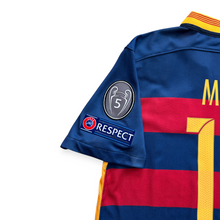 Load image into Gallery viewer, Close-up of the back of a blue and red striped soccer jersey with yellow trim, featuring a Champions League patch on the sleeve and the number 7.