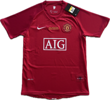 Load image into Gallery viewer, "Cristiano Ronaldo #7 Manchester United Youth Jersey Full Display - Nike 2007-2008 Champions League Home Kit with Official Red Devils Branding and Authentic Retro Design" Red shirt front view