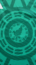 Load image into Gallery viewer, Closeup of Mexican Eagle soccer jersey 2026 world cup