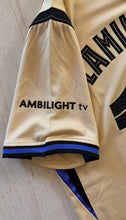 Load image into Gallery viewer, Beige sports jersey with 'Ambilight TV' branding on a neutral background "FC Barcelona x Kobe Mamba Yamal Jersey Sleeve Detail - Nike Special Edition with Official Player Font, Barcelona Branding, and Unique Beige Mamba Colorway"