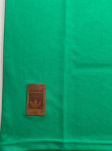 Load image into Gallery viewer, "Mexico 1986 World Cup Retro Jersey Side View - Adidas Copa Mundial Home Kit with Classic Green Design, White Sleeve Accents, and Official Mexican Crest" Bottom jersey tag leather
