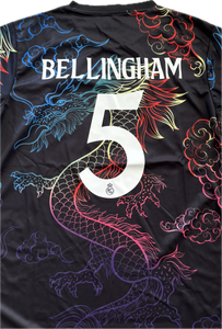 Black sports jersey with colorful dragon design and 'Bellingham 5' text