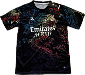 Black sports jersey with colorful dragon design and Emirates branding Bellingham