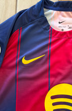Load image into Gallery viewer, Close-up of a sports jersey with Nike logo on a red and blue background Lamine Yamal
