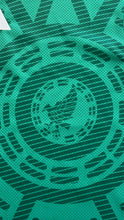 Load image into Gallery viewer, Closeup of Mexican Eagle soccer jersey 2026 world cup
