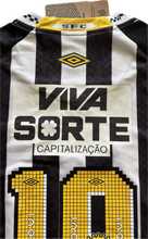 Load image into Gallery viewer, Neymar Jr santos jersey Black and white striped sports jersey with yellow and black text and logos with viva sorte sponsor and umbro logo
