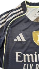 Load image into Gallery viewer, Real Madrid 2025-26 Adidas Mbappe Bellingham Away Jersey close-up of Adidas logo and three stripes
