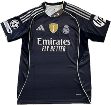 Load image into Gallery viewer, Real Madrid 2025-26 Adidas Mbappe Bellingham Away Jersey with Intercontinental &amp; Champions League Patches Front view with champions league, Patch and Patch sleeves, including Real Madrid and Adidas
